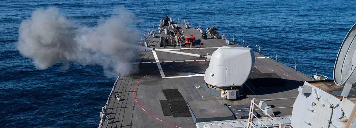 USS Russell (DDG 59) fires its 5-inch gun